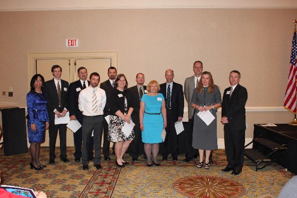 In May, high school teacher grant recipients with chapter representatives are (l-r) Col. Jenkins-Harden; Ivan Middleton; Steve Mlodzik; Jacob Farmer; Robert Young; Kathy Snider; John MacFarlane; Karen Leidecker; Mike Kloenne; Tom Harder; Karen Kelling; and Col. Pohlmann.